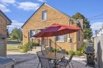 Enjoy Lounging Out Back in the SoHa Sun on Our Home`s Outdoor Patio Area - Complete with a Shade Umbrella